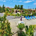 Lykke Piscina Y Jardin By Deihu Experiences Бусанада